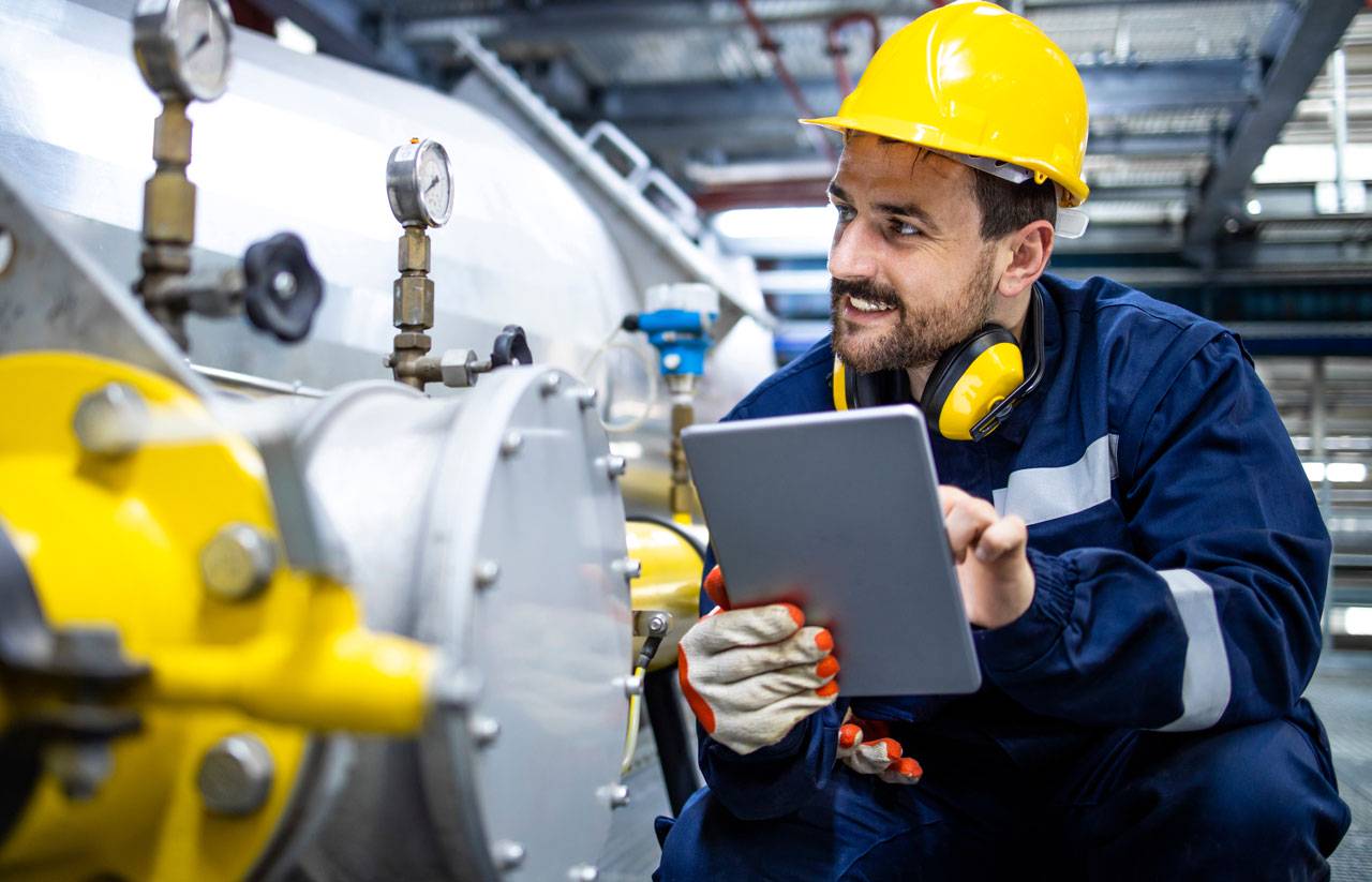 Gas Maintenance worker with tablet